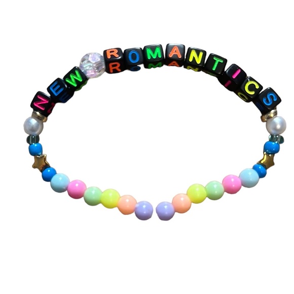 5 for $20 Taylor Swift Handmade Friendship Beaded Bracelet
“New Romantics” - Picture 2 of 2